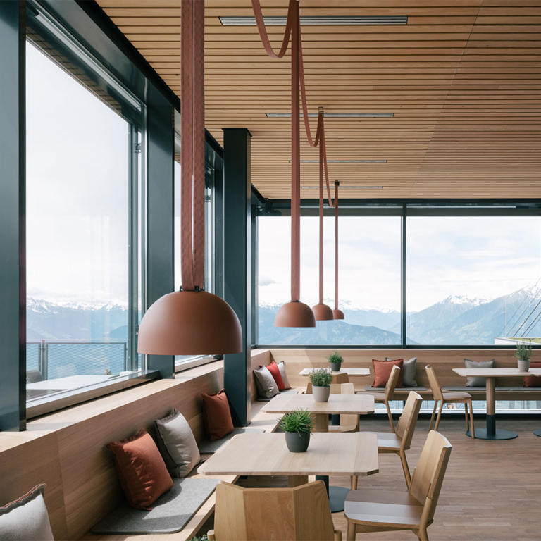 Plusminus adds a touch of colourful and functional design to the Merano 2000 cable car restaurant, Italy